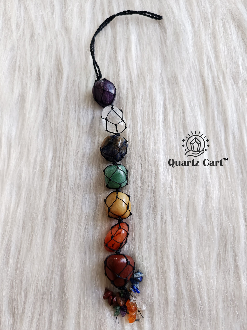 7 chakra stone hanging with tree of life charm on white background