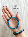 Blue Apatite bracelet on hand showing natural gemstone beads for clarity focus and manifestation energy