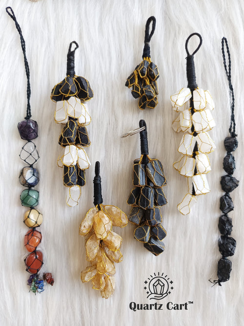 colorful 7 chakra hanging decor with tree charm displayed on wall