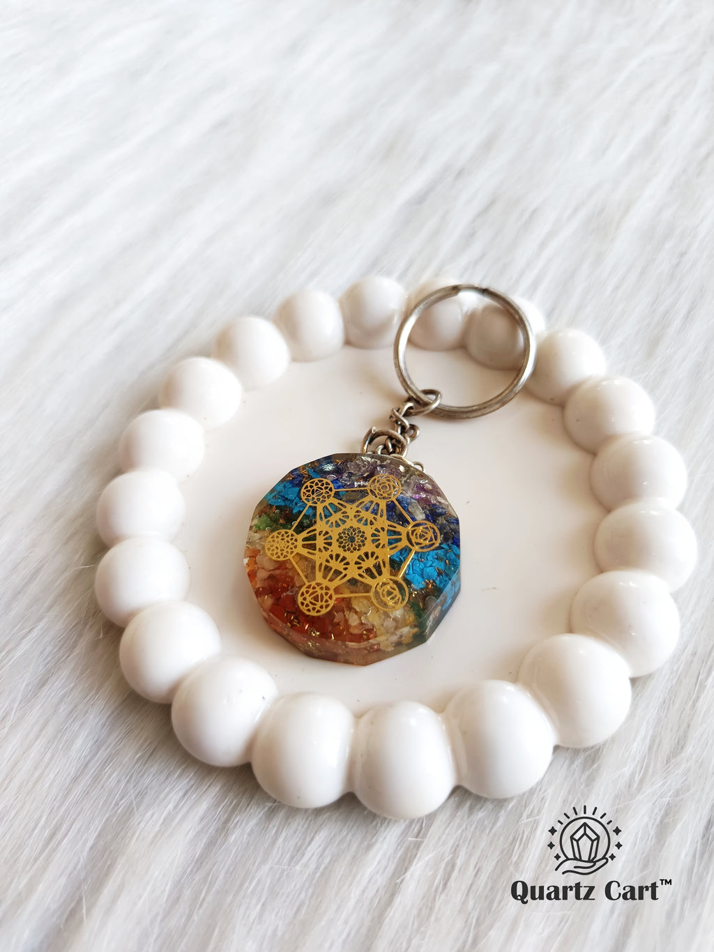 healing chakra orgone keychain with white crystal bracelet