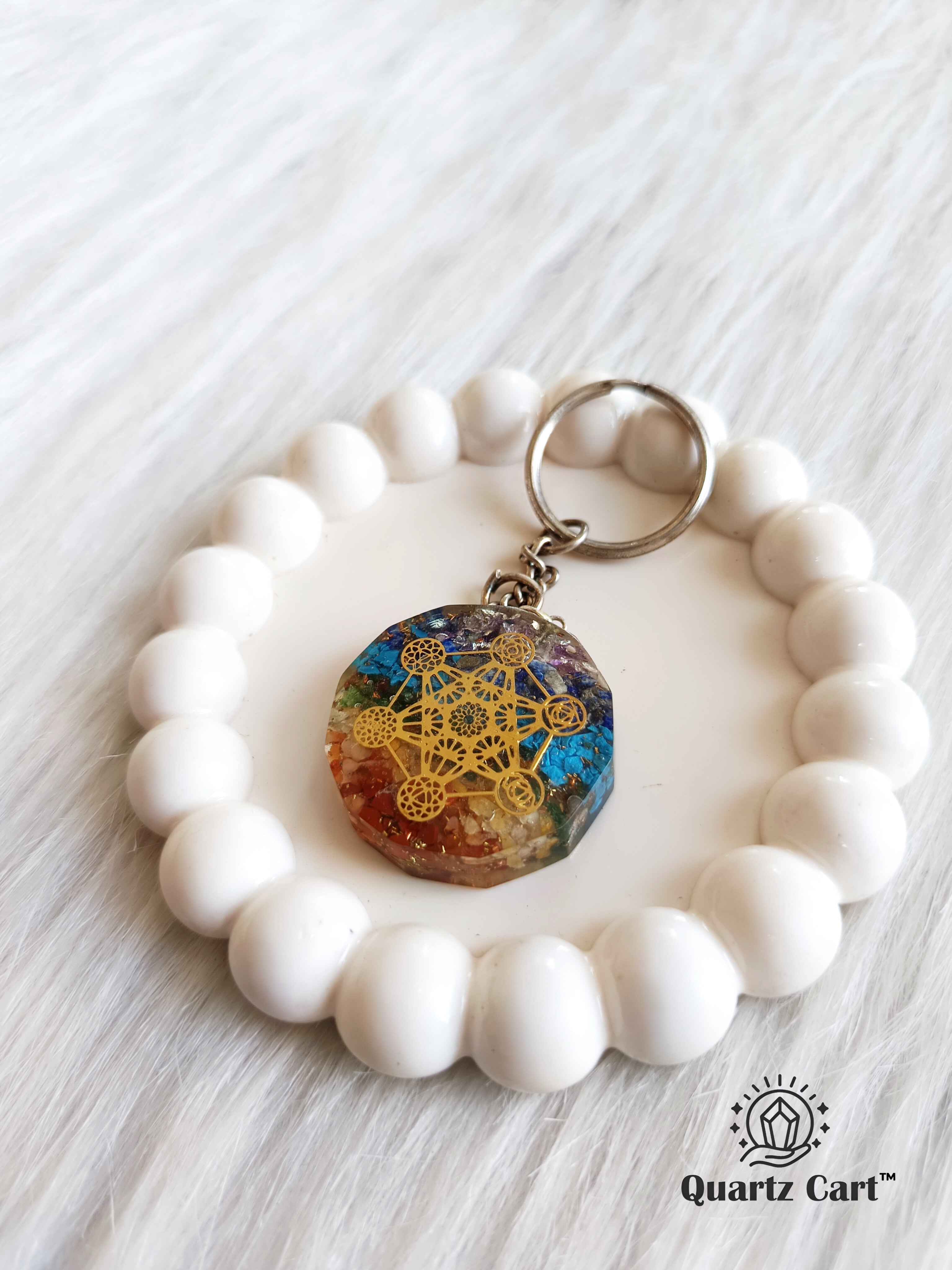 healing chakra orgone keychain with white crystal bracelet