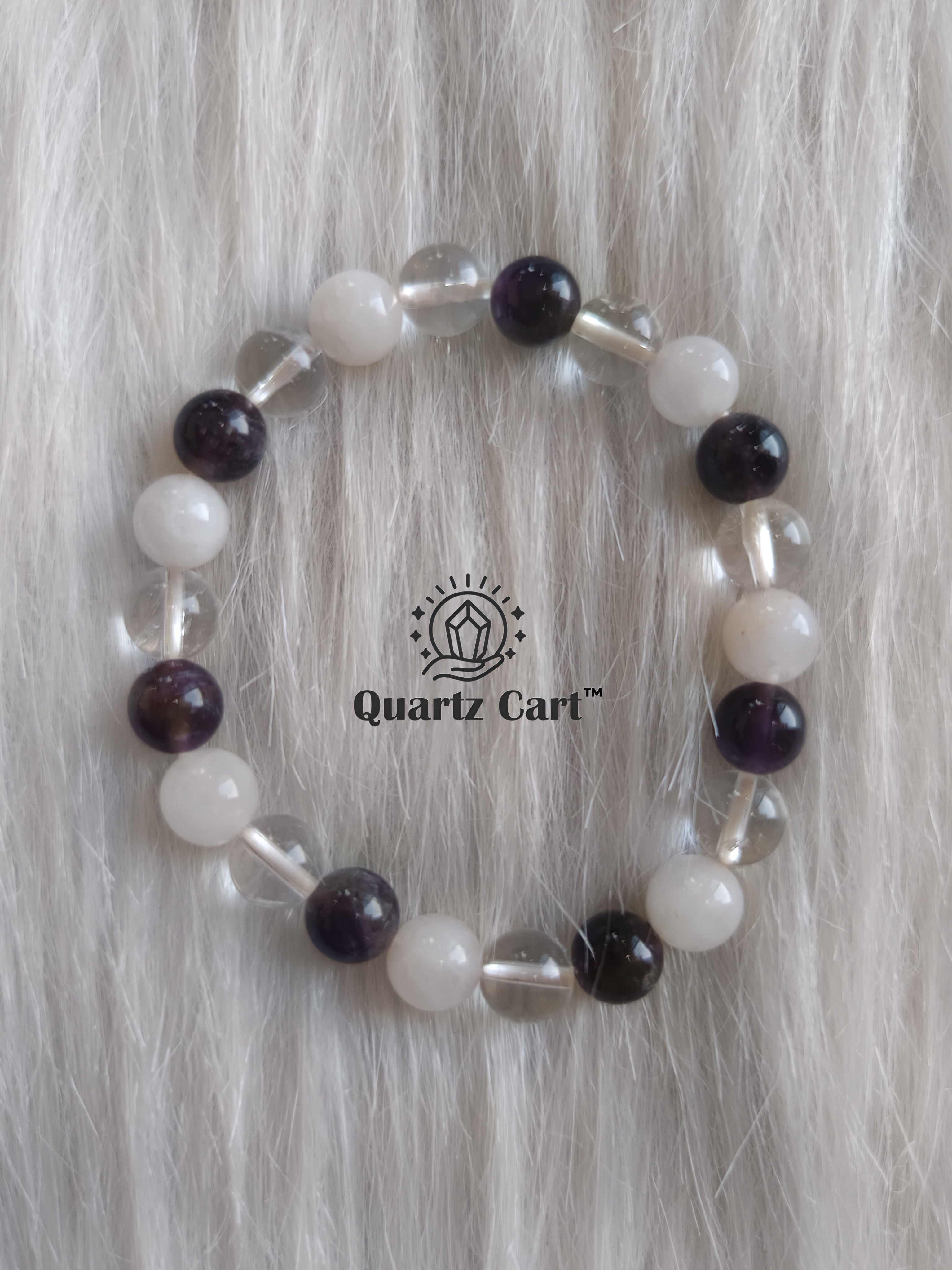 Happiness round bracelet displayed on soft surface with natural gemstone beads, healing crystal bracelet for joy, positivity and emotional balance