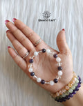 Happiness round bracelet held on hand showing natural gemstone beads, crystal bracelet for happiness, peace and positive energy