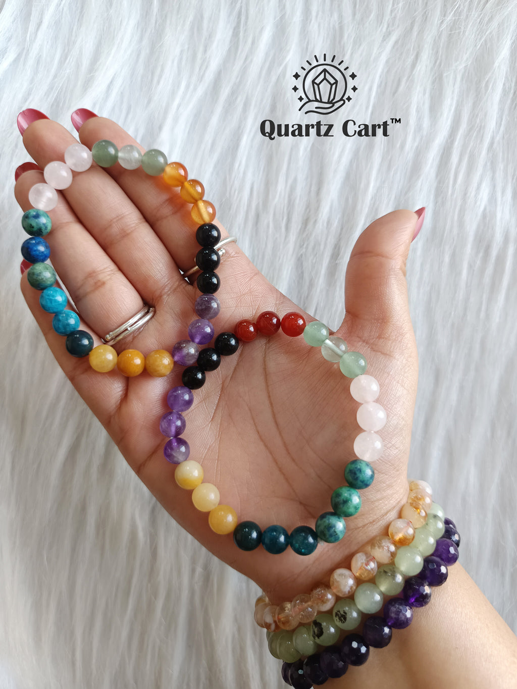 Women wearing multi crystal knee support healing bracelet with colorful beads for joint comfort and energy balance.
