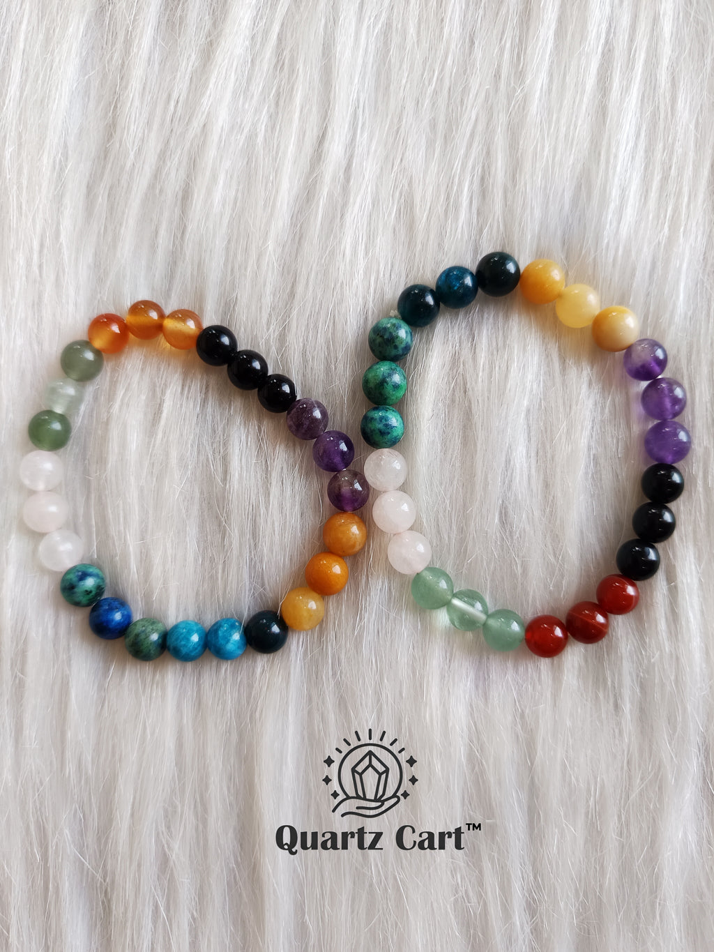 Set of two multi crystal healing bracelets for knee support, joint comfort and wellness placed on white background.