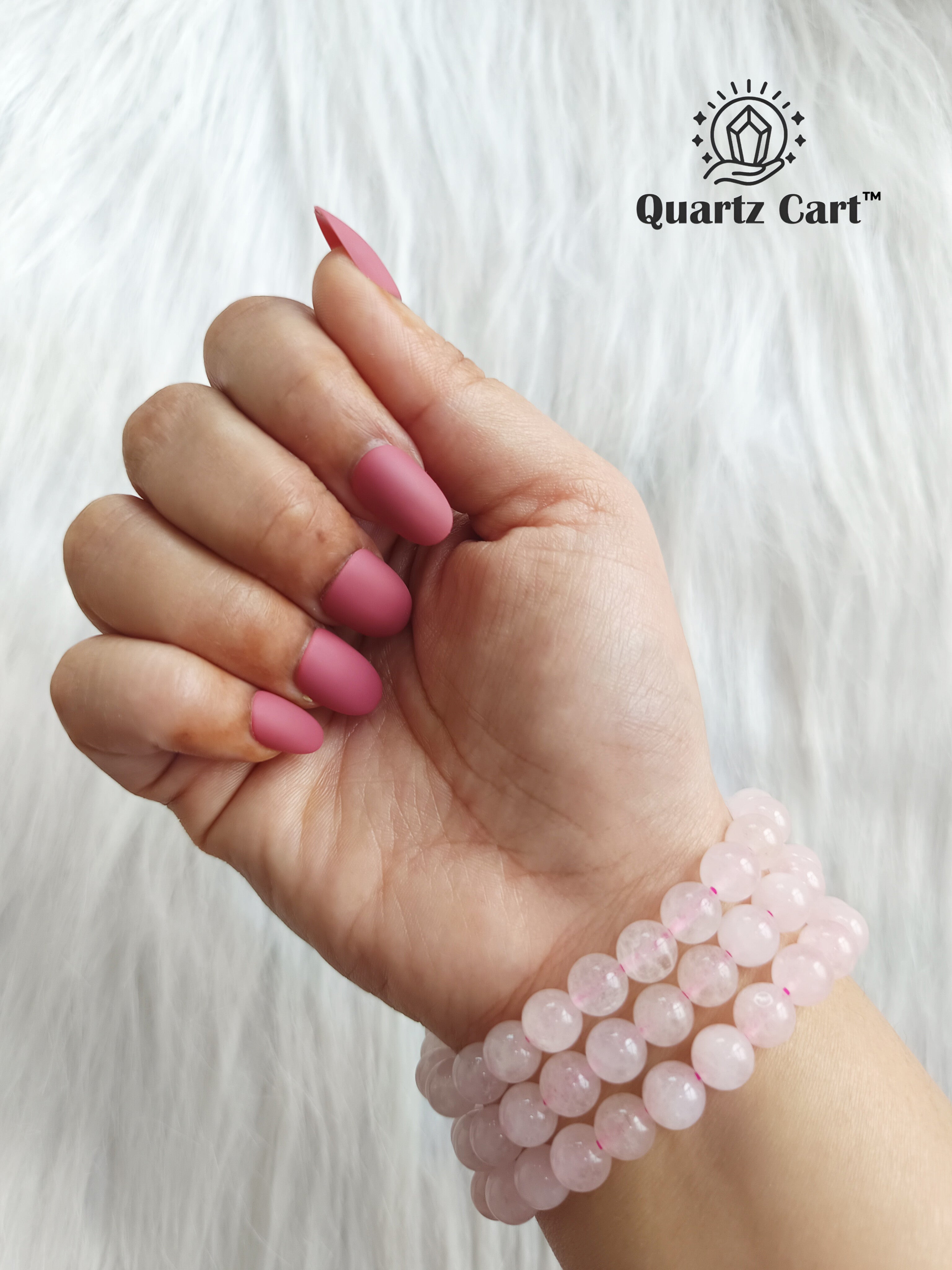 Rose Quartz gemstone bracelet worn on wrist for love emotional healing and heart chakra energy